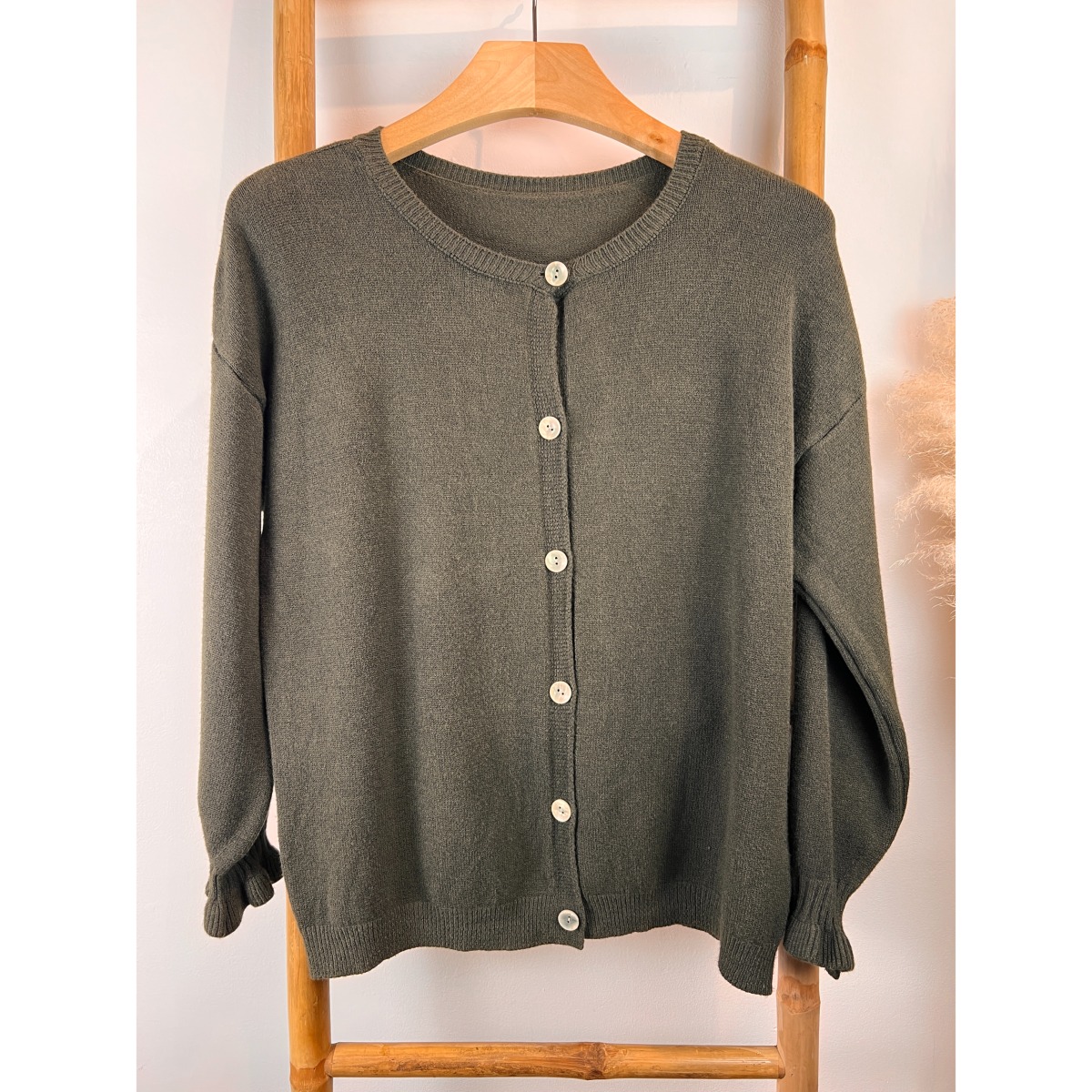 Gilet bas des manches en vagues