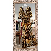 Robe longue magique du 38 au 52 imprimée fleurs ocres fond noir