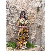 Robe longue magique du 38 au 52 imprime fleurs ocres fond noir